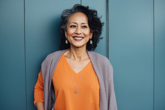 Portrait of a beautiful middle-aged woman smiling at the camera