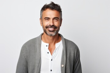 Portrait of handsome middle-aged man smiling and looking at camera