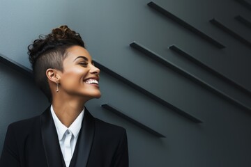 Portrait of smiling young african american businesswoman looking away