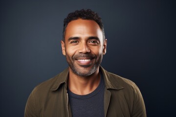 Handsome african american man smiling and looking at camera