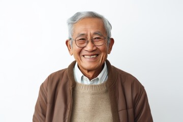 Portrait of happy asian senior man smiling on white background.