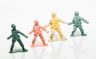 plastic toy soldiers throwing grenade