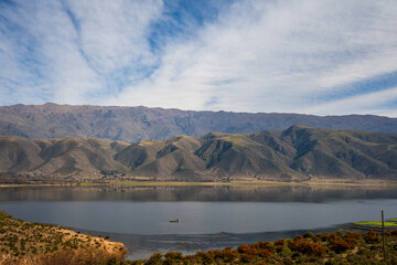 Fototapeta na wymiar calm and colorful lake landscape with mountains