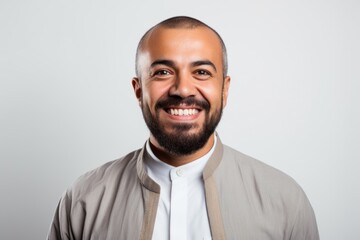 Portrait of a happy latin man isolated on a white background