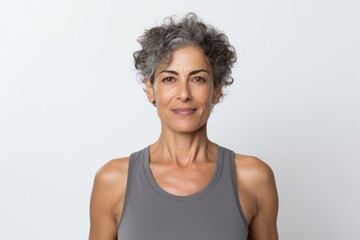 Portrait of beautiful middle-aged woman with grey hair on white background