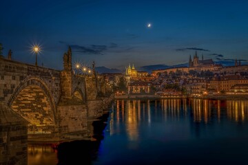 Scenic view of the Charles bridge in Prague, Czechia at sunset