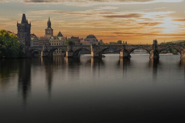 Fototapeta premium Scenic view of the Charles bridge in Prague, Czechia at sunset