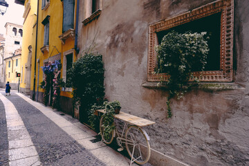 Historic center of Verona, alleys with ancient houses, Italy - 636750500