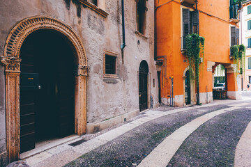 Historic center of Verona, alleys with ancient houses, Italy - 636750526