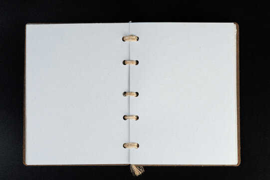 Notebook binder with white pages and cloth material