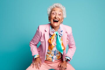 Portrait of a 100-year-old elderly Russian woman in a pastel or soft colors background wearing a smart pair of trousers