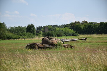 Russian (Soviet) T-55 tank wreck on military range in Biedrusko, Poland