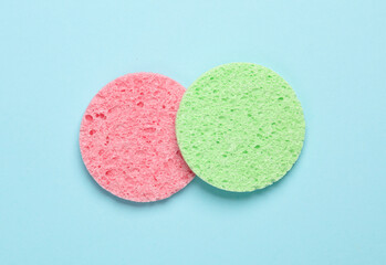 Make-up remover sponges on blue background