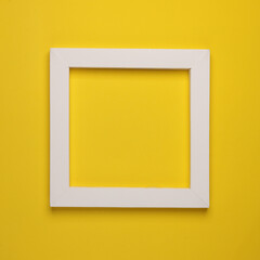 White frame on yellow background. Creative layout. Minimalism