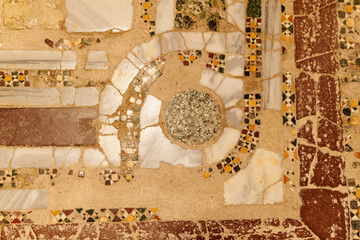 Marble old mosaic in the temple. Old antique wall texture. Old antique temple inside. Ancient...