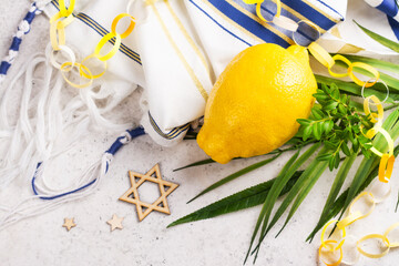 Jewish holiday Sukkot. Traditional symbols, citron, myrtle, branch of willow and palm branch. Festive Sukkot background