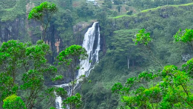 Devon Fall. It is a Waterfall in Talawakele, Nuwara Eliya District, Sri Lanka. 
The fall is named after a pioneer English coffee planter called Devon, whose plantation was situated nearby the falls.