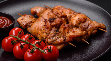 Delicious fresh, juicy chicken or pork kebab on skewers with salt and spices
