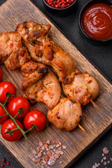Delicious fresh, juicy chicken or pork kebab on skewers with salt and spices