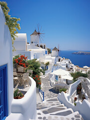 Picturesque landscape of Santorini island with white-washed houses and iconic mills