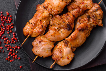 Delicious fresh, juicy chicken or pork kebab on skewers with salt and spices