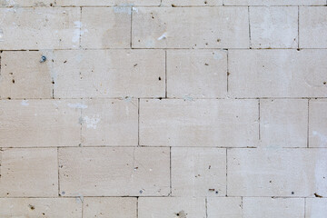 Old rough texture wall surface from shell blocks. Background or backdrop. Blank for design, graphic resource