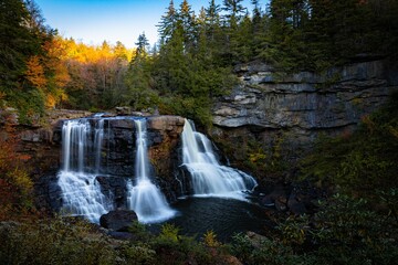 Fototapeta na wymiar Awe-inspiring landscape featuring Blackwater Falls surrounded by lush vegetation. West Virginia.
