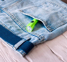 Top view flashlight in pants pocket