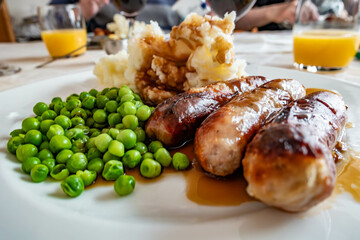 Sausages, mashed potatoes and garden peas for dinner.