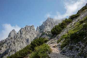 Fototapeta na wymiar Hiking trail to the middle Karwendel pit and to the mountain station of the Karwendel cable car.