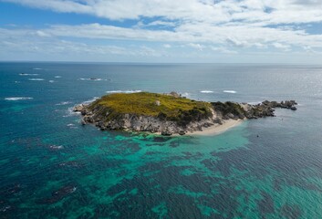 An aerial shot of an island in the ocean