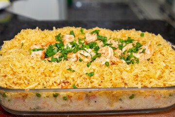 Original Brazilian International Shrimp Recipe in Closeup and Selective Focus. Camarão internacional coco bambu. Brazilian food
