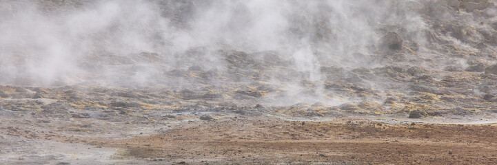 Hverir, Iceland. A surreal, bare orangy-red, geothermal area at the foot of Namafjall. Full of fumaroles, mud pools, steam vents. It's on Route 1. It is also called Namaskard Hverir.