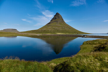 Mount Kirkjufell located on the west coast of Iceland, on the Snæfellsnes peninsula. Iceland icon.