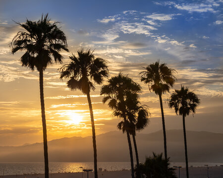 Sunset over Santa Monica Mountains and Pacific Ocean in Santa Monica, California, USA