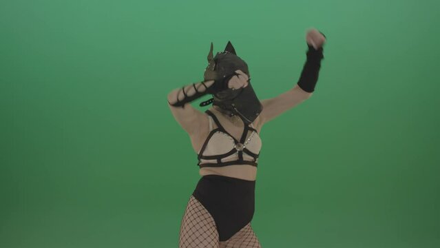 Girl in dog mask making hand beat on green screen