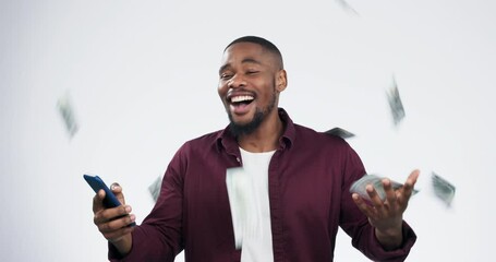 Lotto, cash and black man winning on a phone in celebration isolated in a studio white background. Wow, winner and young person happy or excited for money bonus online from mobile app or internet