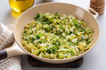 Sauteed cabbage in a cast iron pan, side dish idea