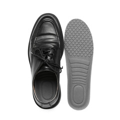 Stylish male shoe with orthopedic insoles on white background