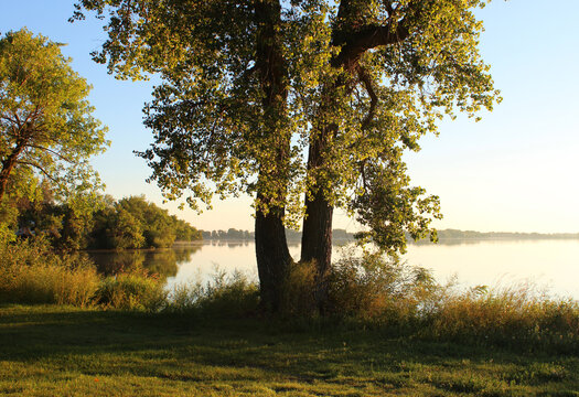 Sunrise over a calm lake in the midwest