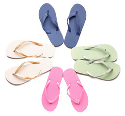 Frame made of colorful pairs of female flip flops on white background