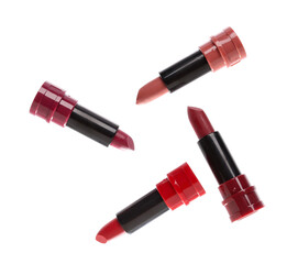 Obraz premium Different stylish lipsticks on white background
