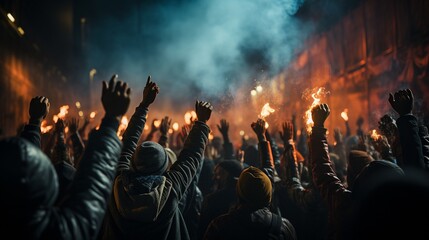 Fototapeta na wymiar raised fists in the midst of the rioting mob.