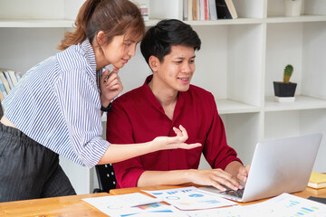 Marketing, Financial, Accounting, Planning, Team of business women analyze company results and profits with graph statistics. Use a laptop computer and a calculator to calculate the company balance.