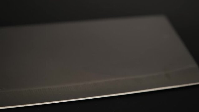 Kitchen knife. Large sharp knife with stainless steel handle isolated on white background.