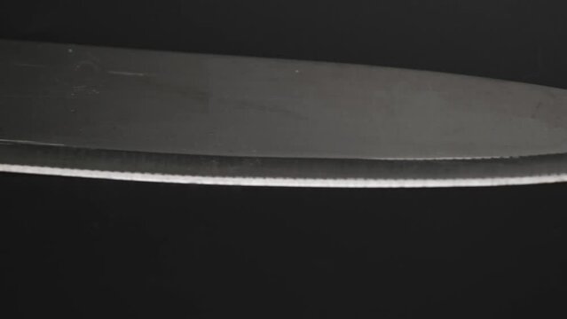 Kitchen knife. Large sharp knife with stainless steel handle isolated on white background.