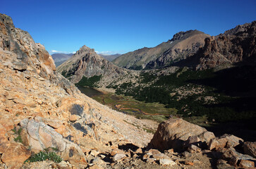 Mountain landscape, Valley of Toncek lagoon surrounded by steep granite rocks of Cerro Catedral in Nahuel Huapi National Park, Nature of Patagonia, Argentina