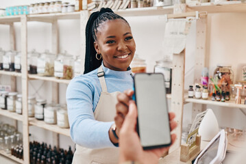 Customer, black woman and payment with smartphone screen, finance and machine for transaction in a store. Business, shop assistant and employee with client, cellphone and technology with service
