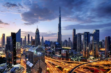 Fototapete Burj Khalifa Dubai modern skyline  architecture by night with illuminated skyscrapers, United Arab Emirates