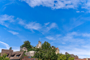 Fototapeta na wymiar Scenic view of the old town of City of Baden with castle ruins at famous fun fair named Badenfahrt on a sunny summer noon. Photo taken August 19th, 2023, Baden, Canton Aargau, Switzerland.